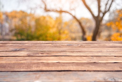 Empty wooden table nature bokeh background with a country outdoor theme,Template mock up for display of product Copy space