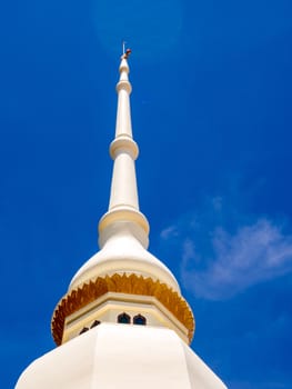 Gorgeous fine white pagoda in Buddhist temple and the bright blur sky