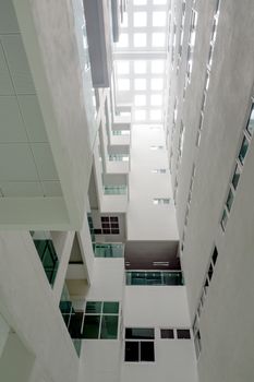 A Low vantage point in hall the high rise building, Looking up to the Daylight from the clerestory on the top of the building