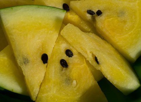 Yellow watermelon with slices and wedges for effective watermelon diet