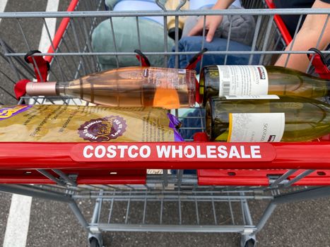 Orlando, FL/USA-11/1/20:  A shopping cart filled with purchases at a Costco Wholesale retail store in Orlando, Florida.