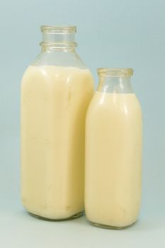 A couple bottles of cold fresh dairy milk from the farm.
