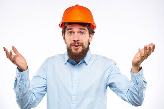 emotional men orange helmet engineer construction industry lifestyle cropped view. High quality photo