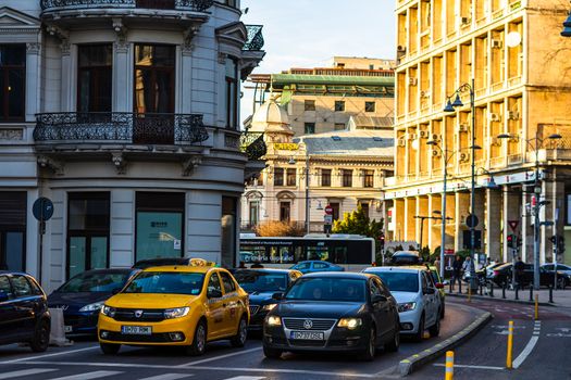 Car traffic at rush hour in downtown area of the city. Car pollution, traffic jam in the morning and evening in the capital city of Bucharest, Romania, 2020