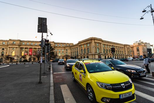 Car traffic at rush hour in downtown area of the city. Car pollution, traffic jam in the morning and evening in the capital city of Bucharest, Romania, 2020