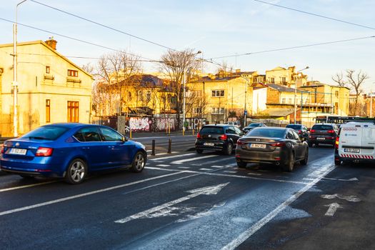 Car traffic at rush hour in downtown area of the city. Car pollution, traffic jam in the morning and evening in the capital city of Bucharest, Romania, 2020