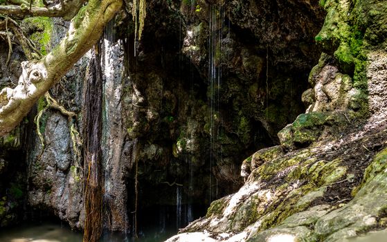 Water jets in the Baths of Aphrodite waterfall on the island of Cyprus.