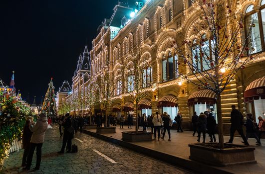 December 20, 2019. Moscow, Russia. Decorated Christmas tree on red square in front of the Gum building in Moscow at night.