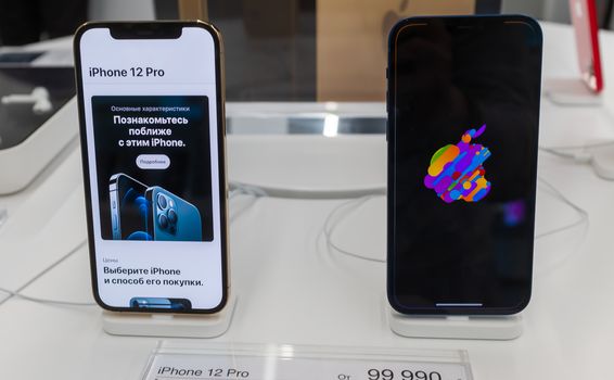 October 23, 2020, Moscow, Russia. New smartphones from the Apple Iphone 12 and Iphone 12 pro on the store counter.