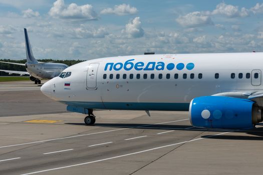 July 2, 2019, Moscow, Russia. Airplane Boeing Boeing 737-800 Pobeda airline at Vnukovo airport in Moscow.