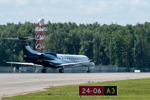 July 2, 2019, Moscow, Russia. Airplane Embraer ERJ-135 Avcon Jet at Vnukovo airport in Moscow.