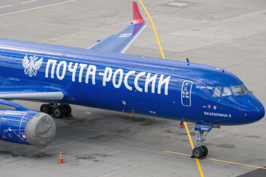 July 2, 2019, Moscow, Russia. Tupolev Tu-204  Aviastar  airline in the blue livery of the company Russian Post at Vnukovo airport in Moscow.