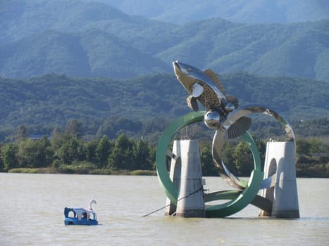 Chuncheon, South Korea- 19th Sep, 2020: The Statue of fish in middle of Soyanggang or soyang river with blue sky