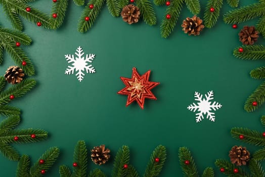 Happy new year, christmas day concept top view flat lay fir tree branches and decoration on Olive Green background with copy space for your text