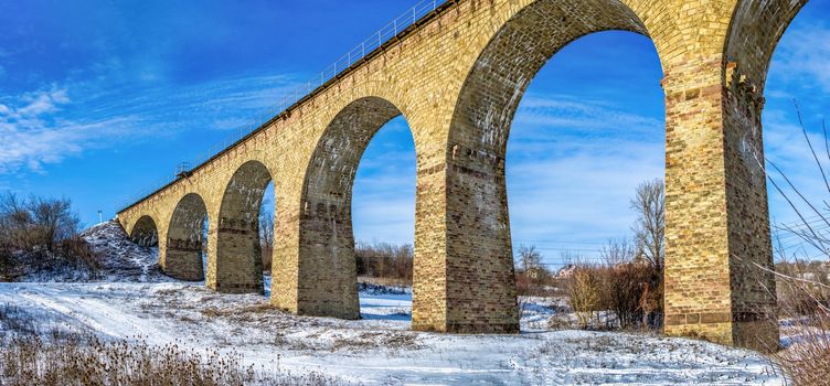 Plebanivka, Ukraine 01.06.2020. Viaduct in Plebanivka village, Terebovlyanskiy district of Ukraine, on a sunny winter day