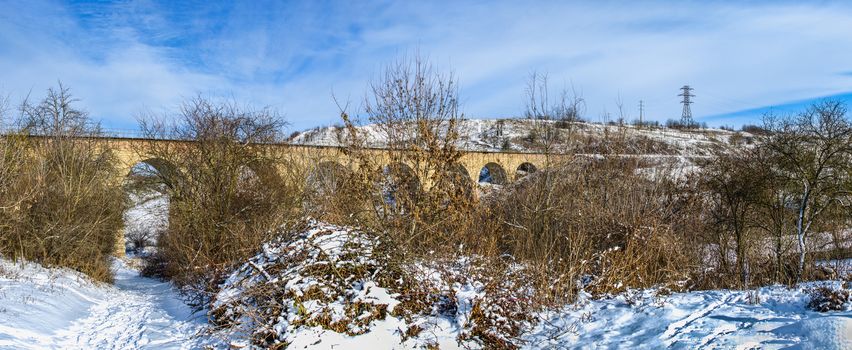 Plebanivka, Ukraine 01.06.2020. Viaduct in Plebanivka village, Terebovlyanskiy district of Ukraine, on a sunny winter day