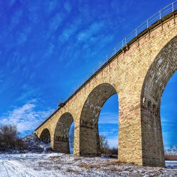 Plebanivka, Ukraine 01.06.2020. Viaduct in Plebanivka village, Terebovlyanskiy district of Ukraine, on a sunny winter day