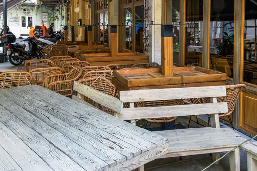 Closed restaurants chairs in the city center, after government tries to prevent COVID-19.