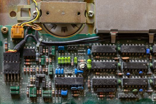 background of old electromechanic device closeup in dark colors with dust