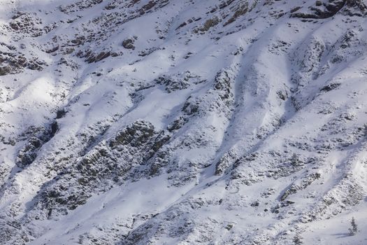 Snowy mountains landscape in the Aragonese Pyrenees. Near of Aguas Tuertas valley, Hecho and Anso, Huesca, Spain.