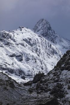 Snowy mountains landscape in the Aragonese Pyrenees. Near of Aguas Tuertas valley, Hecho and Anso, Huesca, Spain.