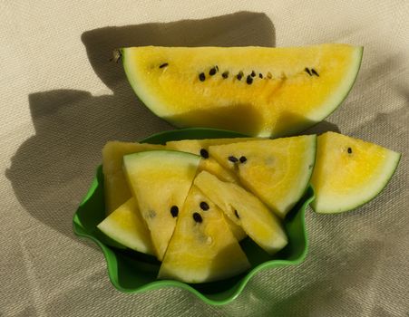 Yellow watermelon with slices and wedges for effective watermelon diet