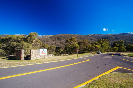 Thredbo, Australia - April 11, 2015: A sign at Thredbo ski resort on a clear day in autumn in the Snowy Mountains, New South Wales, Australia