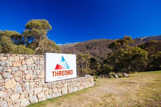Thredbo, Australia - April 11, 2015: A sign at Thredbo ski resort on a clear day in autumn in the Snowy Mountains, New South Wales, Australia