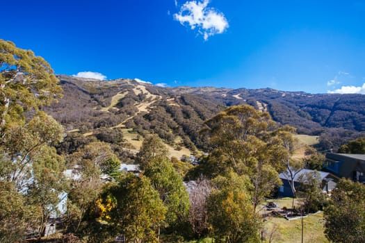 Thredbo, Australia - April 11, 2015: A view of Thredbo ski resort on a clear day in autumn in the Snowy Mountains, New South Wales, Australia