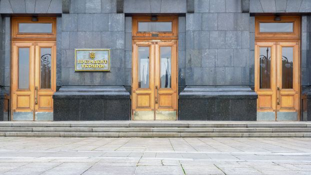 Plaque with an Inscription in the Ukrainian - President of Ukraine on Office of the President of Ukraine Building in Kyiv, Main Entrance, Doors, Facade. Presidential Administration of Ukraine in Kiev.