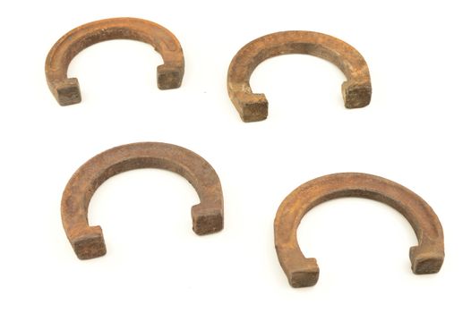 Four horse shoes isolated over white.