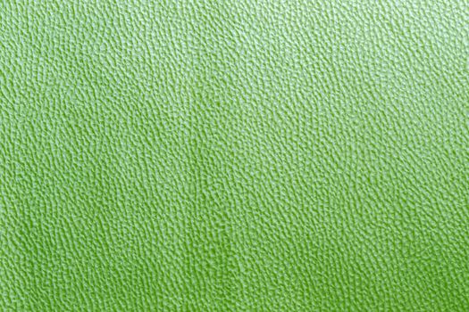 non-voven furniture upholstery green texture and background with small concavities random pattern