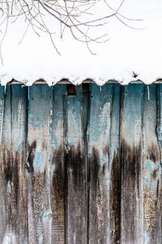 old wooden barn planks wall winter texture and background with selective focus.