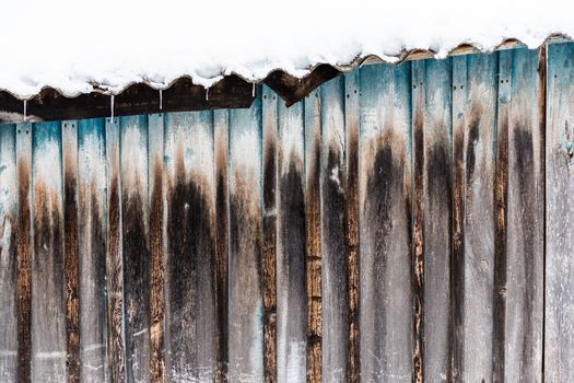 old wooden barn planks wall winter texture and background.