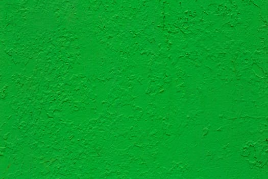 new layer of green glossy oil paint flat surface texture over peeled old layer