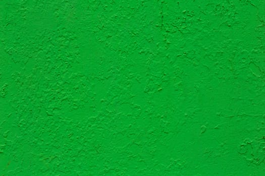 new layer of green glossy oil paint flat surface texture over peeled old layer