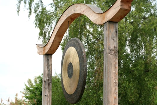 Big gong hanging outdoor in a japanese garden