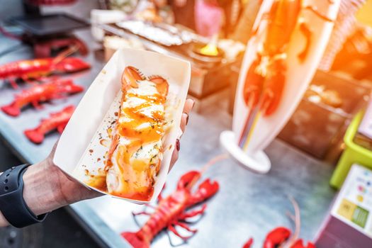 Roasted lobster with cheese at Myeong-dong street food in Seoul, South Korea