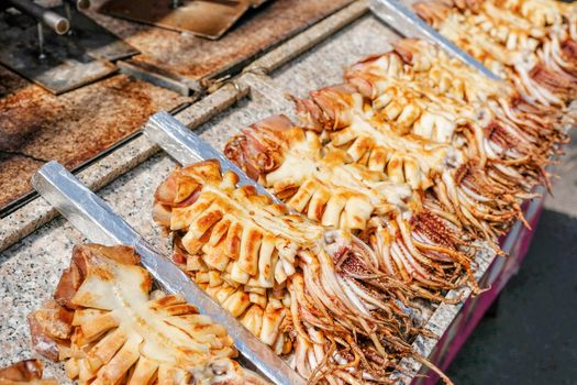 Grill octopus street food at myeong-dong in Seoul, South Korea.