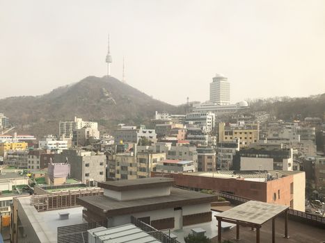 Cityscape rainy day view of Seoul and Namsan Seoul Tower, South Korea