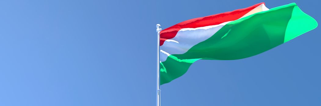 3D rendering of the national flag of Hungary waving in the wind against a blue sky.