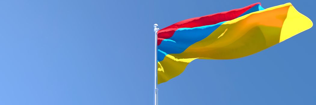 3D rendering of the national flag of Armenia waving in the wind against a blue sky.