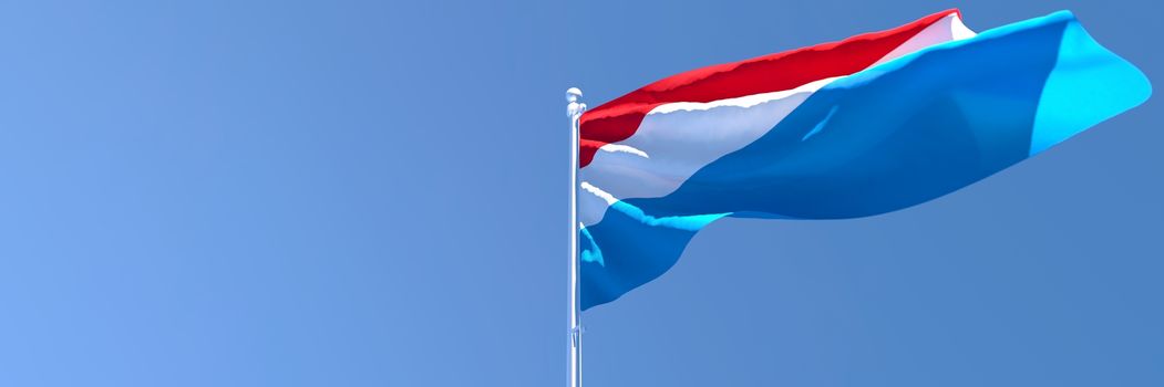 3D rendering of the national flag of Netherlands waving in the wind against a blue sky