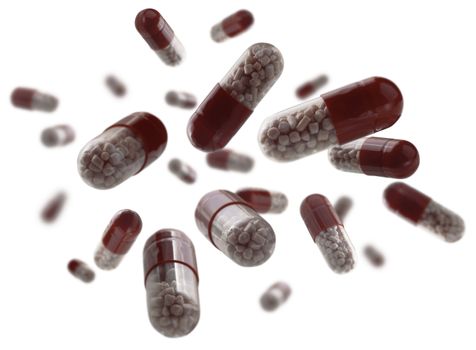 Capsules with the drug levitate on a white background.