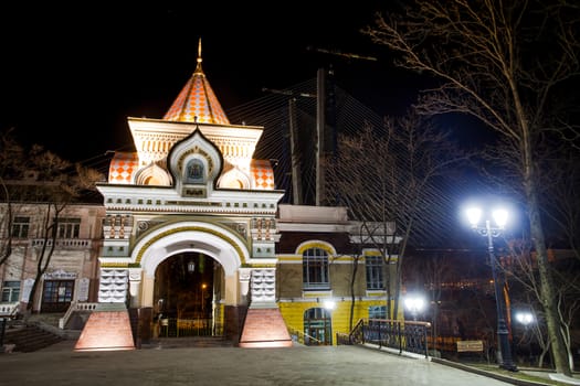 The Triumphal Arch of the Tsarevich in Vladivostok at night.