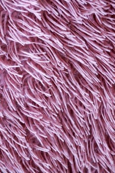 faux pink fur, vertical texture for background.