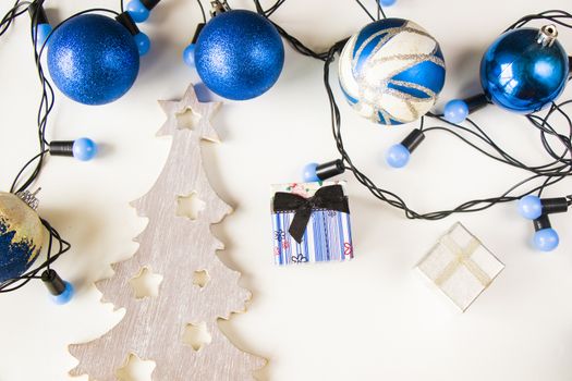 Merry christmas and happy new year 2021 blue set background, tree, toy, gift box and garland on the white background