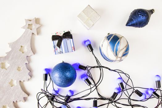 Merry christmas and happy new year 2021 blue set background, tree, toy, gift box and garland on the white background