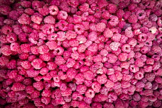 View from above. Juicy and delicious berry. Textured background.