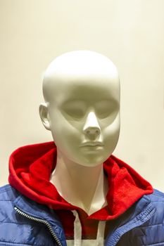 female mannequin face at a shop.